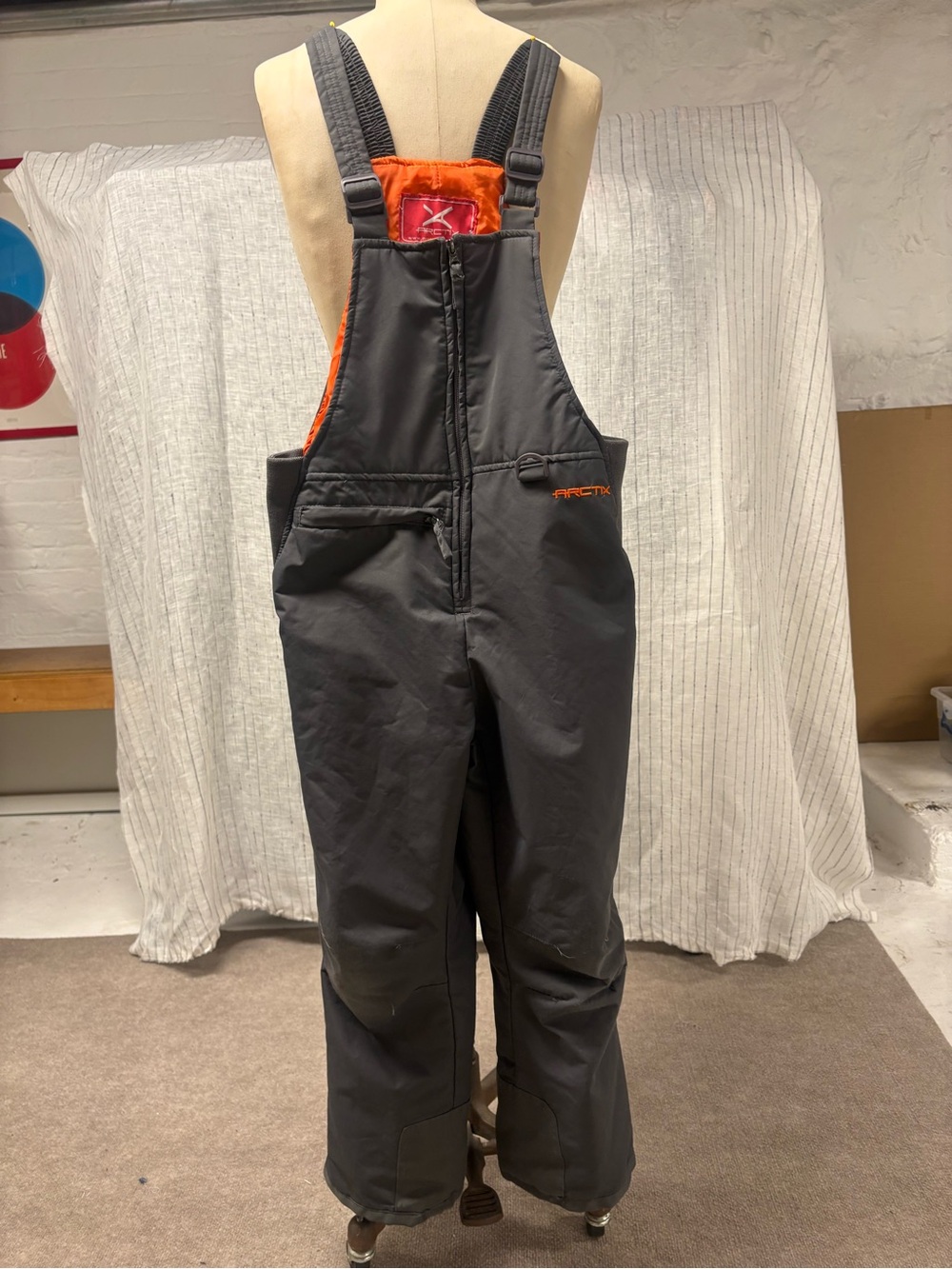 Arctix Kids Gray Bib Snow Pants with Orange Lining
Size Youth M